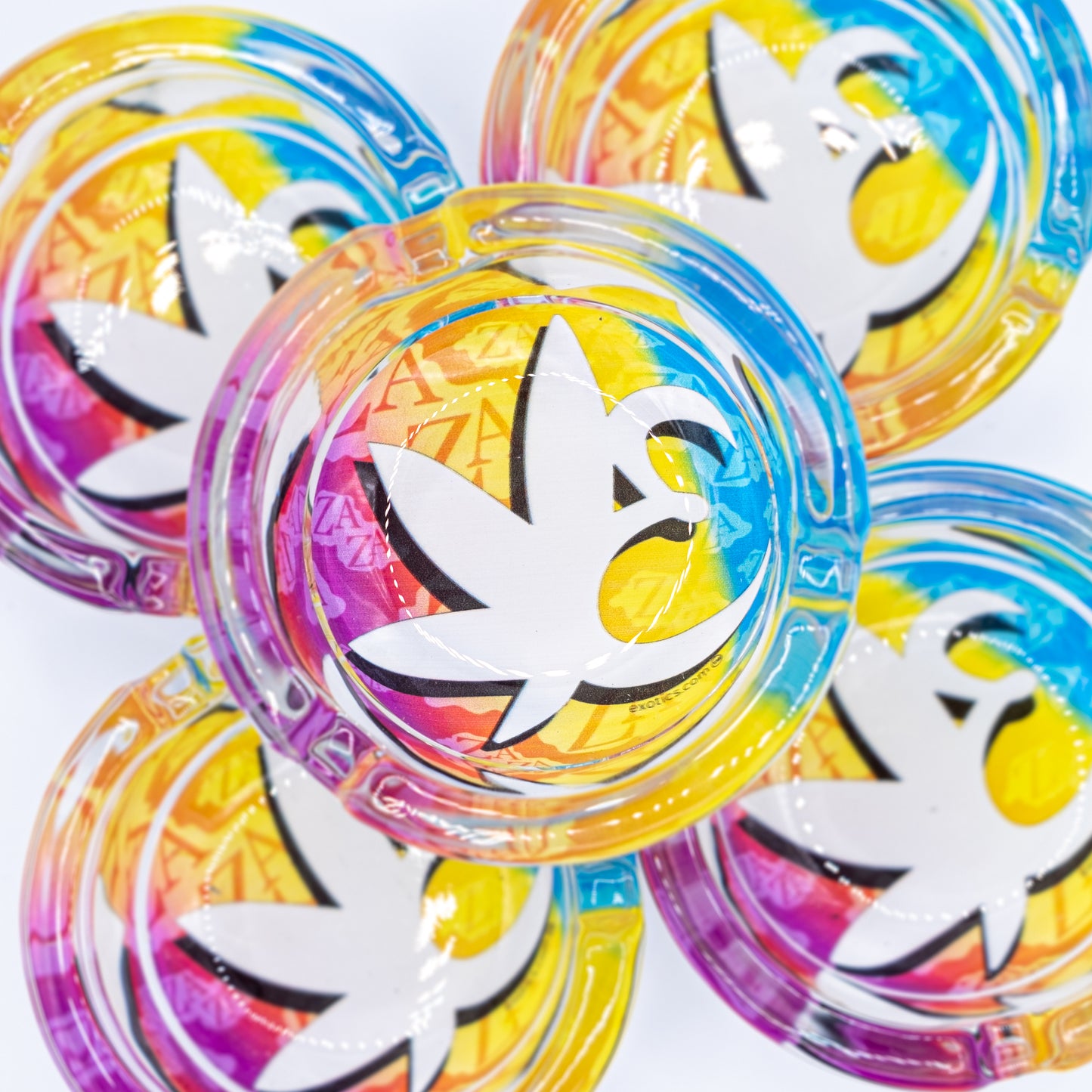 Five clear Exotics ashtrays with rainbow logos