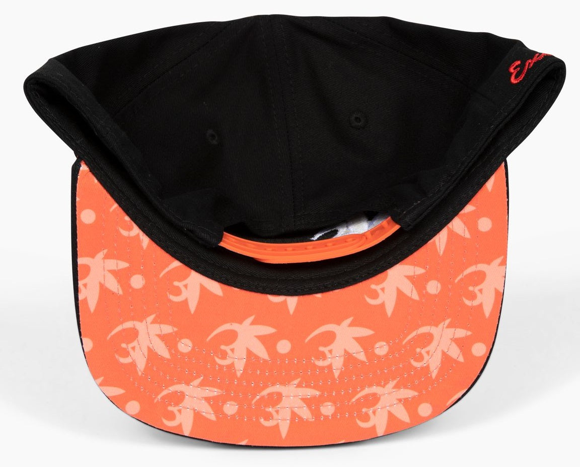 Black Exotics snapback hat with red brim and snap
