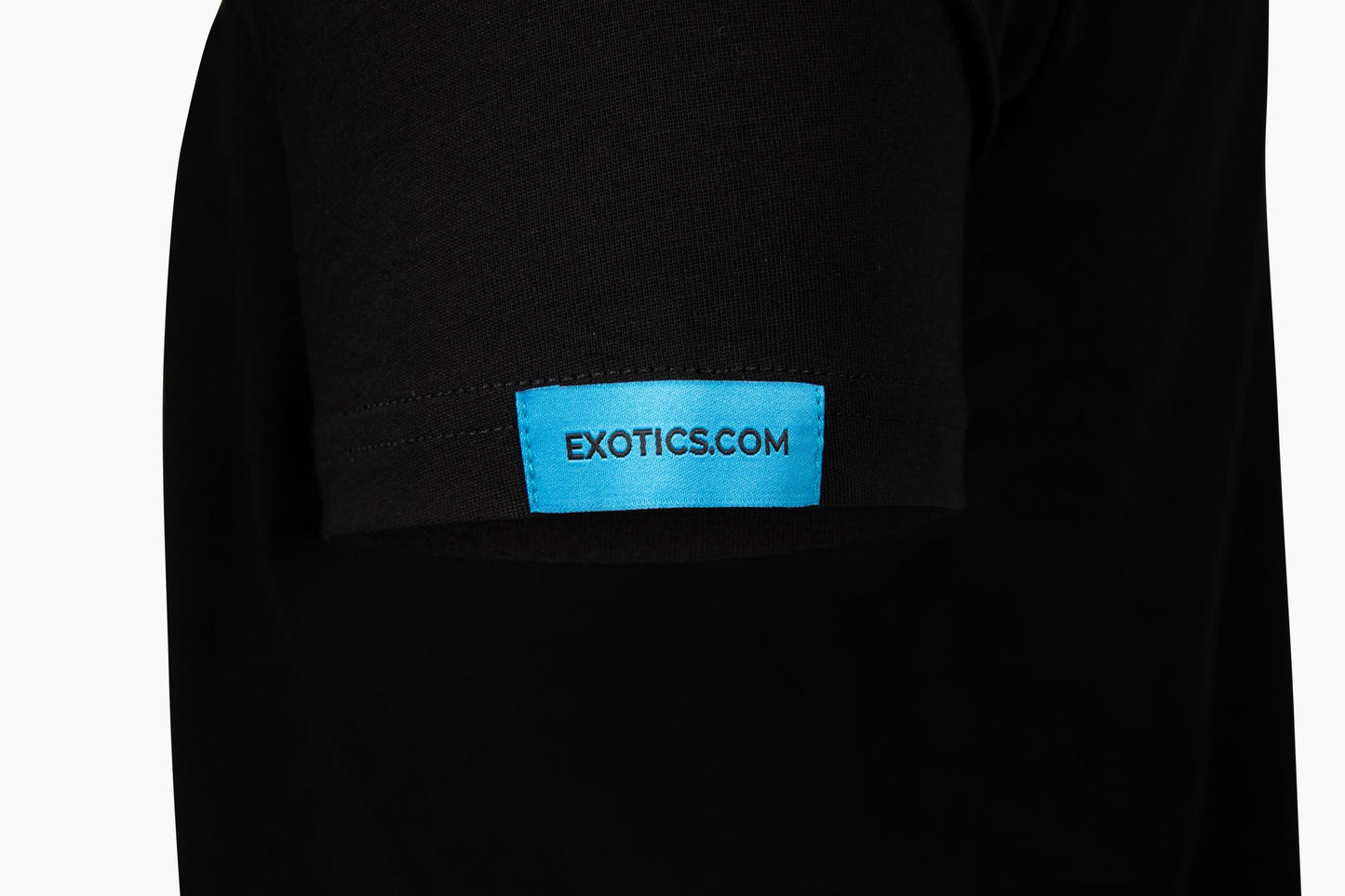 Black Exotics tee t-shirt with blue tag on left sleeve