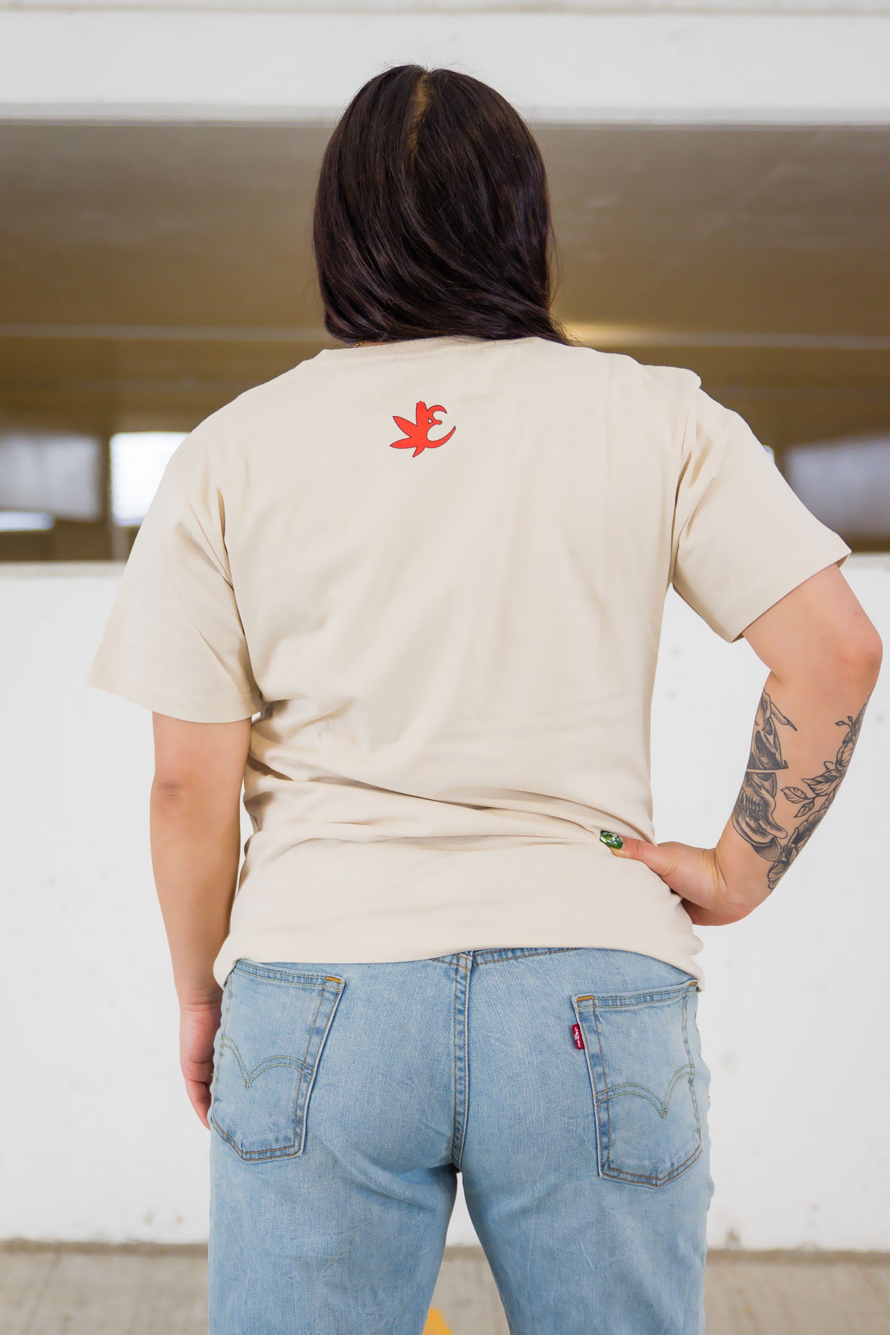 Back of woman wearing Exotics Monkey Berries tee t-shirt