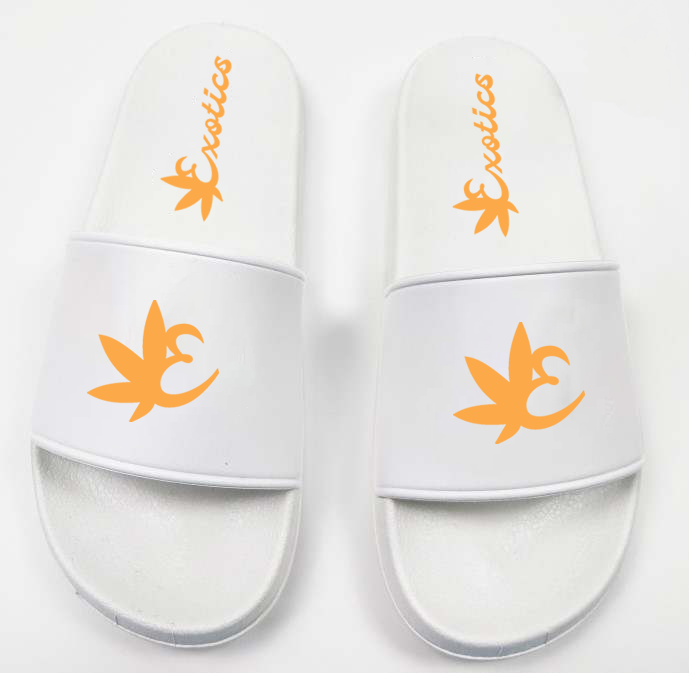 White Exotics slides with orange logo
