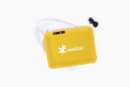 Yellow valet tray with white Exotics logo